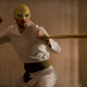 Danny Rand, wearing an Iron Fist mask. Finally?